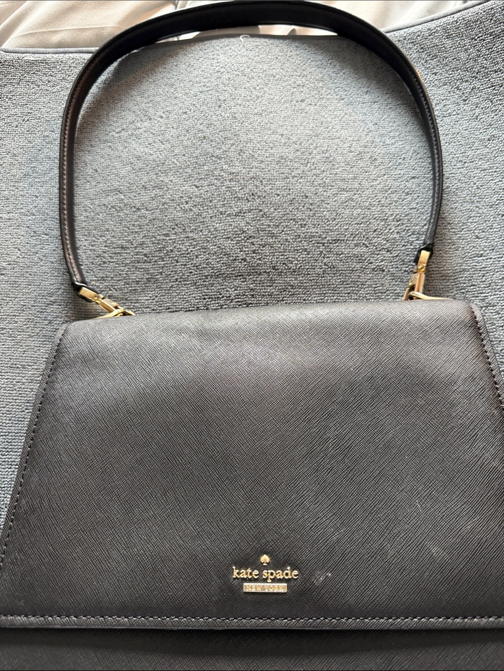 kate spade black leather shoulder bag with gold hardware detail